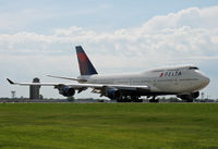 N666US @ KMSP - While visiting the Minnesota Air Guard Museum, this beauty came right toward me, as if she were asking to be photographed along with the other planes. - by Daniel L. Berek