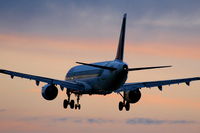 I-BIXI @ EGLL - landing into the sunset on RW 27R at Heathrow - by Chris Hall