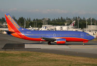 N661SW @ KPAE - KPAE Qatar 777 A7-BBH on the paint shop ramp in the background - by Nick Dean