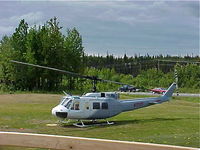 N72171 @ PASX - Bell UH-1H, N72171 at a pad north of PASX. - by Mark Kalfas