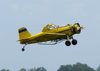 N91968 - Dusting a field about 10 miles north of Natchitoches, Louisiana.