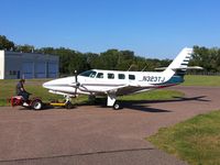 N323TJ @ MIC - 1983 Cessna T303, c/n: T30300243, tow me away - by Timothy Aanerud