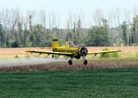 N91968 - Dusting a field about 10 miles north of Natchitoches, Louisiana. Fun to watch and I bet is fun to do! - by paulp