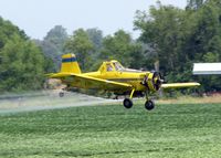 N91968 - Dusting a field about 10 miles north of Natchitoches, Louisiana. Fun to watch and I bet is fun to do! - by paulp
