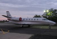 N671QS @ KAXN - Cessna 560XL Citation by the fuel pumps.