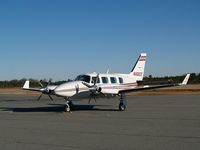 N102QT @ GWW - Parked for maintenance @ Goldsboro-Wayne - by George Zimmerman