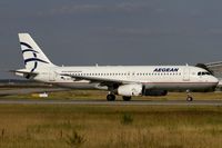SX-DVI @ EDDF - departing via RW18W - by Friedrich Becker