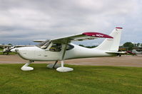 N390TT @ KEOK - Waiting out the rain - by Glenn E. Chatfield