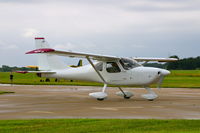 N390TT @ KEOK - Taxiing for departure - by Glenn E. Chatfield