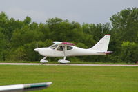 N390TT @ KEOK - Departing RY14 - by Glenn E. Chatfield