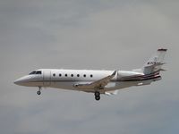 N719QS @ ONT - On final to 26R - by Helicopterfriend