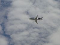 N719QS @ ONT - Take off from runway 26L and climbing out going west - by Helicopterfriend