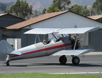 N65124 @ SZP - 1943 Boeing Stearman A75N1 'Spirit of OPEC', P&W R-985 Wasp Jr. (by Jacobs) 450 Hp upgrade, square wingtips, Restr. Exp. class, on Rwy 04 to make 180 deg. turn to Rwy 22 for smoke takeoff practice - by Doug Robertson