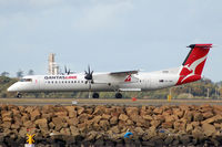 VH-QOI @ YSSY - At Sydney - by Micha Lueck