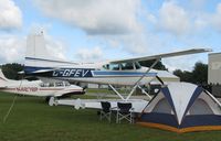 C-GFEV @ Y50 - Cessna A185F Skywagon in the grass. - by Kreg Anderson