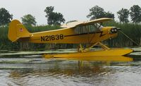 N21638 @ 96WI - Piper J3C-65 Cub moored at AirVenture 2010. - by Kreg Anderson