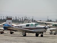 N7153V @ CNO - Tied down and parked - by Helicopterfriend