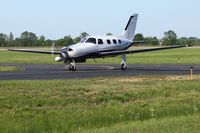 N409CP @ DLZ - Departing Delaware, Ohio - by Bob Simmermon