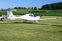 N105MK @ 2D7 - Parked in the grass at the Father's Day breakfast fly-in, Beach City, Ohio. - by Bob Simmermon