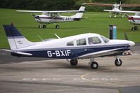 G-BXIF @ EGCB - 1976 Piper PIPER PA-28-181, c/n: 28-7690404 refuels at City of Manchester Airport - by Terry Fletcher