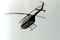 N90740 @ RDG - MBB Bo.105C on a demonstration flight at the 1977 Reading Airshow. - by Peter Nicholson