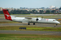 VH-QOE @ YSSY - At Sydney - by Micha Lueck