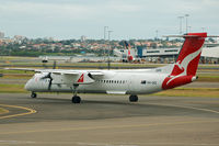 VH-QOI @ YSSY - At Sydney - by Micha Lueck