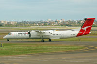 VH-QOC @ YSSY - At Sydney - by Micha Lueck