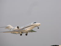 N792XJ @ KOSH - Take off from Oshkosh - by steveowen