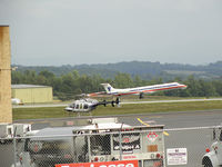 N601DW @ TRI - American Eagle Embraer ERJ-145 comes in for a landing at Tri-Cities Airport on July 21, 2010. - by Davo87