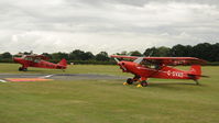 G-BLPE @ EGTH - 5. A pair of Super Cubs at Shuttleworth Military Pagent Air Display August 2010