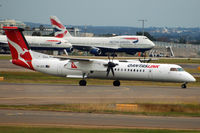 VH-QOS @ YSSY - At Sydney - by Micha Lueck