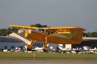 N77661 @ KOSH - Fairchild 24R-46 - by Mark Pasqualino