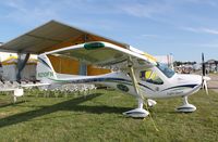 N210FN @ KOSH - Remo GX - by Mark Pasqualino