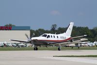 N769JS @ KOSH - Socata TBM 700 - by Mark Pasqualino