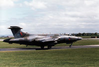 XX885 @ EGQS - Another view of this Buccaneer S.2B of 12 Squadron joining the active runway at RAF Lossiemouth in May 1990. - by Peter Nicholson