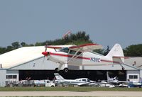 N311C @ KOSH - Stinson 108-2