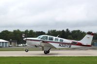 N321TB @ KOSH - Beech A36 - by Mark Pasqualino