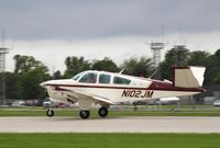 N102JM @ KOSH - Beech V35B