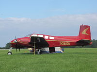 N3682B @ KOSH - Twin Bonanza at EAA2010 airshow - by steveowen