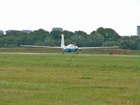 N520DM @ EGPF - Grob G520 getting ready to depart Glasgow - by Ian Woodcock