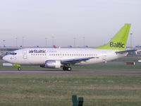 YL-BBH @ EIDW - Air Baltic rolling on r/w 28 - by Robert Kearney