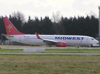 N112MN @ EINN - New aircraft for MidWest airlines - by Robert Kearney
