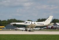 N700PW @ KOSH - Socata TBM 700 - by Mark Pasqualino