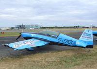 G-ZXCL @ EGLF - Extra EA-300L of the Selex Galileo 'Blades' flying for the RAFA at Farnborough International 2010