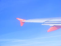 G-EZAJ @ EHAM - over the North Sea on approach to Amsterdam Schiphol - by Chris Hall