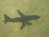 G-EZAJ @ EHAM - shadow of G-EZAJ as we approach Amsterdam Schiphol - by Chris Hall