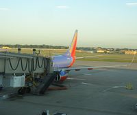 N730SW @ KMSP - Southwest Airlines Boeing 737-700 at the gate at Humphrey terminal. - by Kreg Anderson