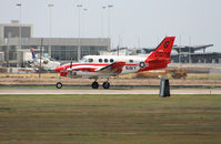 160979 @ KAUS - Navy Beechcraft touches down 17L. - by Darryl Roach