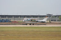 N761NA @ KAUS - Cessna departs 17L. - by Darryl Roach